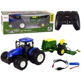 Kék traktor bálázóval
