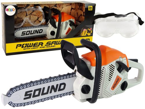 Láncfűrész mozgó lánccal + védőszemüveg. Realisztikus megjelenés és hangok!