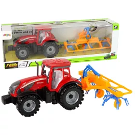 Piros traktor gereblye dörzshajtással