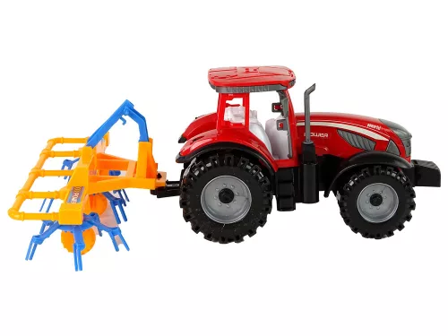 Piros traktor gereblye dörzshajtással