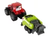 Piros mezőgazdasági traktor zöld vetőgép súrlódó meghajtással