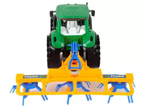 Zöld traktor narancssárga és kék gereblye dörzshajtással