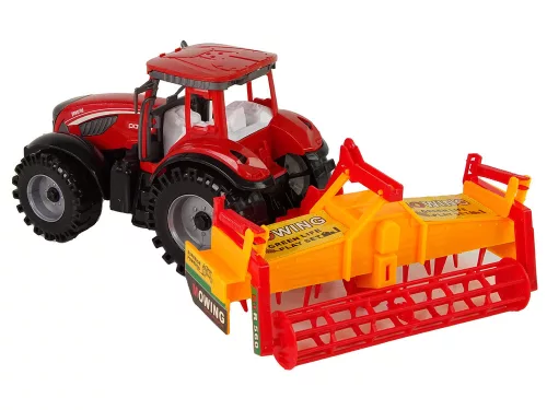 Piros traktor narancssárga kultivátor meghajtással