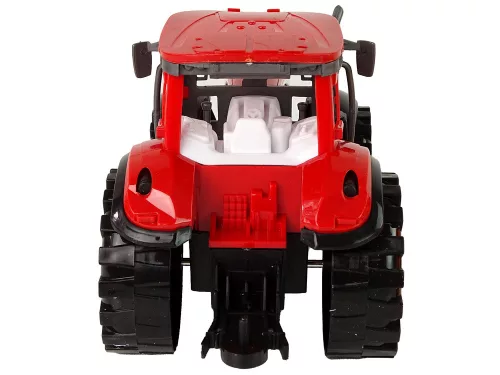 Piros traktor narancssárga kultivátor meghajtással