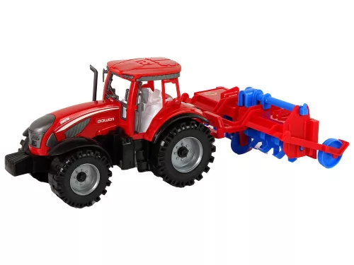 Piros traktor eke súrlódó meghajtással