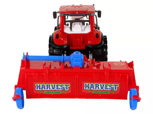 Piros traktor eke súrlódó meghajtással