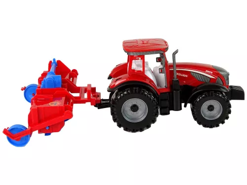 Piros traktor eke súrlódó meghajtással