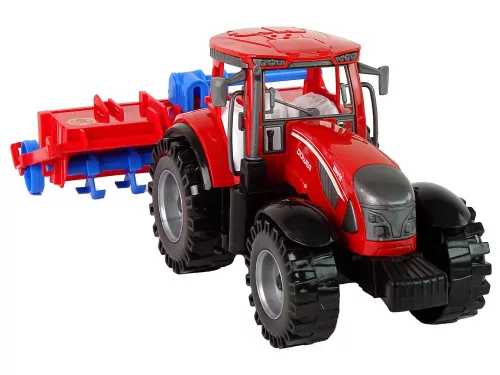 Piros traktor eke súrlódó meghajtással
