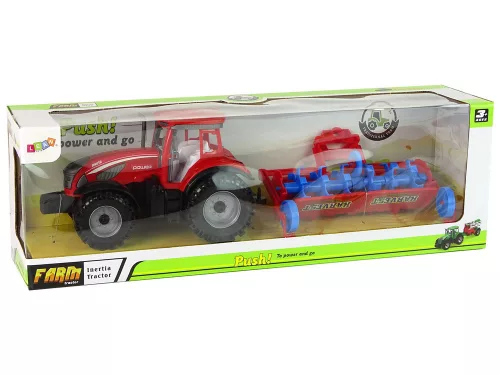 Piros traktor eke súrlódó meghajtással