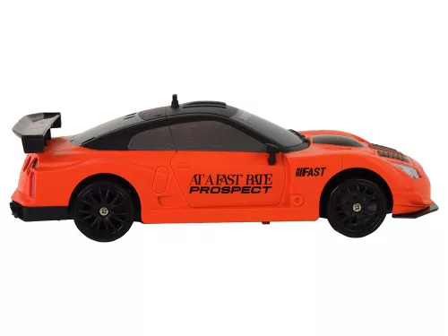 Távirányítós sportautó R/C 1:24 narancssárga cserélhető kerekek